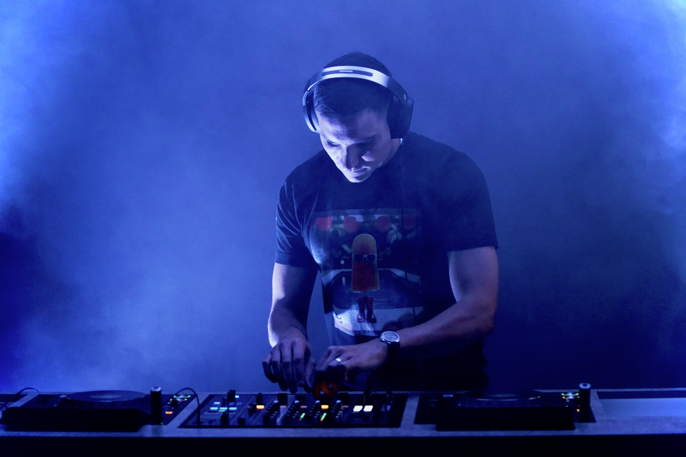 DJ Bolus performing behind the decks